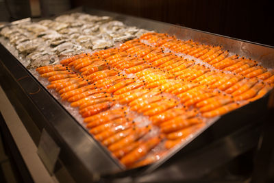 High angle view of meat on barbecue grill