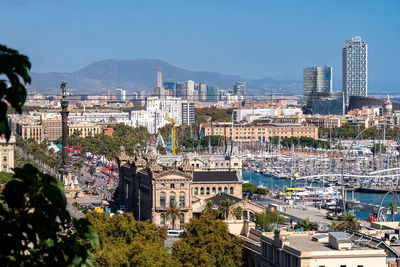 High angle view of city and buildings against sky