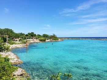 View of people in the bay of sea in cuba