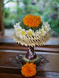 Close-up of flower vase on table