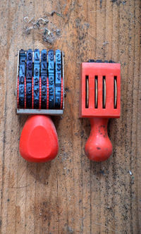 Close-up of stampers on wooden table