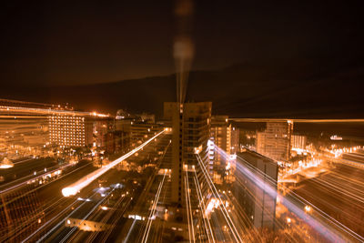 High angle view of illuminated city at night