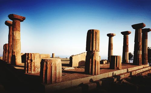 Ancient temple against clear blue sky