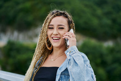 Portrait of smiling young woman