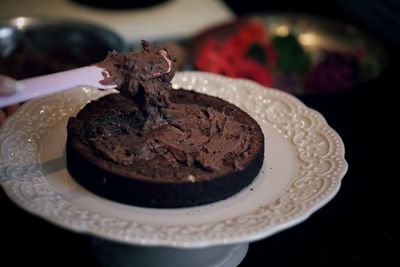 Close-up of chocolate cake in plate on table