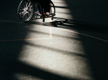 Low section of bicycle on tiled floor