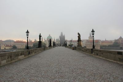 Early foggy morning at charles bridge, prague. czech republic. best location 