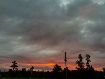 Low angle view of dramatic sky during sunset