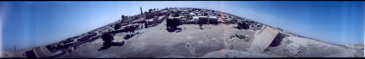 Low angle view of buildings against blue sky