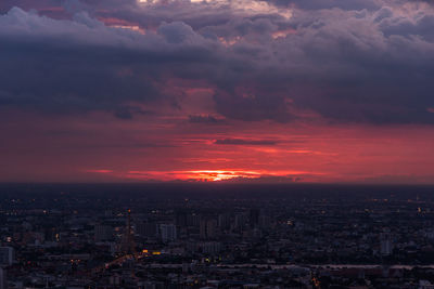 High angle view of buildings against sky during sunset