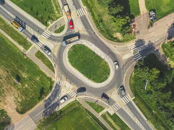 High angle view of road amidst trees in city