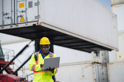 Man working on mobile phone