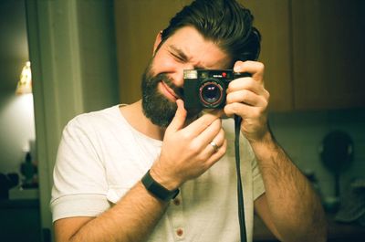 Portrait of man photographing