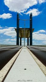 View of road against cloudy sky