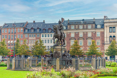 The equestrian statue of christian v on kings new square kongens nytorv in copenhagen, denmark