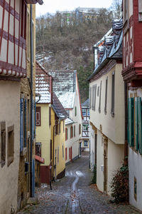 Cobbled alley with half-timbered houses in the city meisenheim, germany in winter