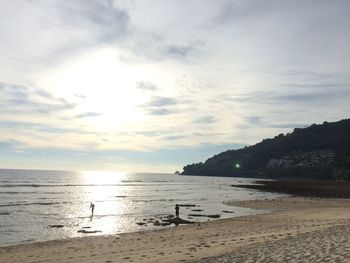 Scenic view of sea against sky at sunset
