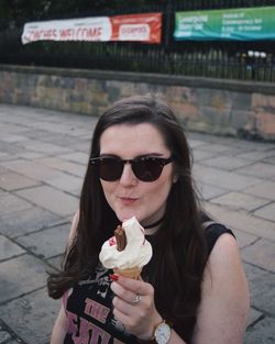 Close-up of woman holding ice cream