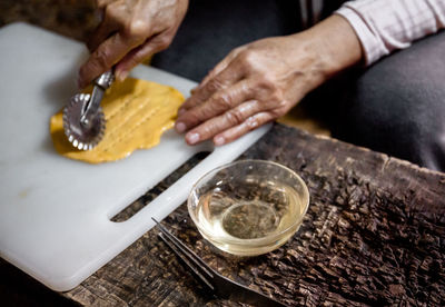 High angle view of man preparing food