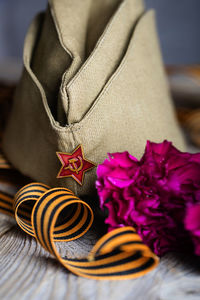 Close-up of purple roses on table