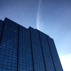 Low angle view of skyscraper against clear sky