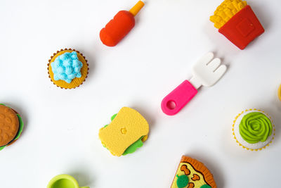 High angle view of multi colored candies on table