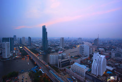 High angle view of buildings against sky during sunset