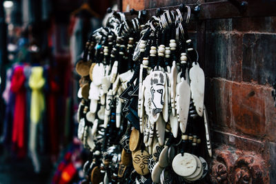 Close-up of clothes hanging in store for sale