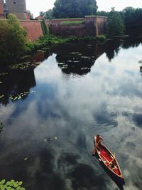 Boats in calm lake