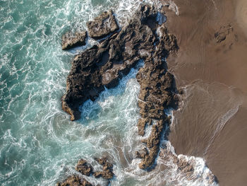 High angle view of rocks on beach