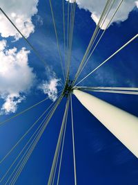 Low angle view of ferris wheel against sky