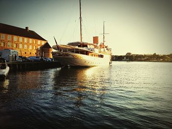 Boats moored at harbor