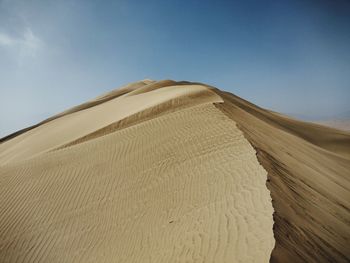 Scenic view of desert against sky