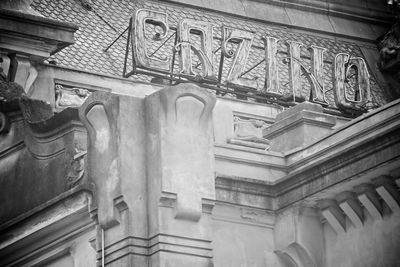 Low angle view of statues on old building