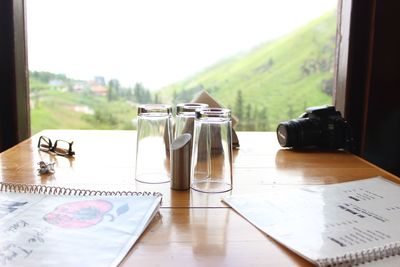 Close-up of camera on table at restaurant