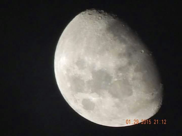 LOW ANGLE VIEW OF MOON IN THE DARK