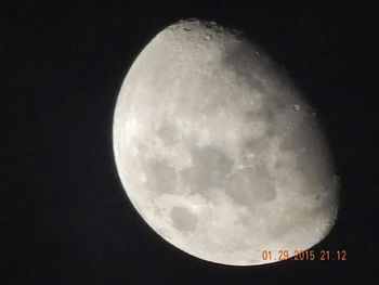 Low angle view of moon in sky