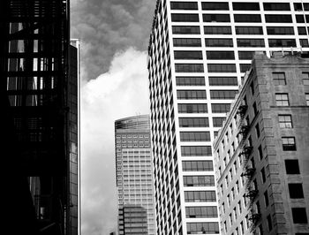 Low angle view of building against cloudy sky