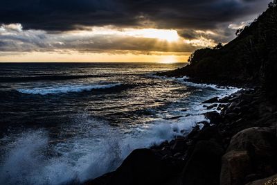 Scenic view of sea against sky during sunset