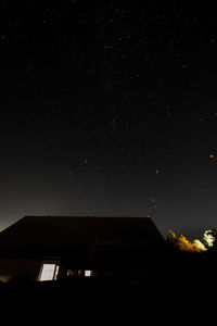Low angle view of building against sky at night