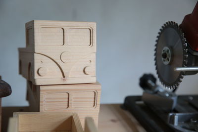 Close-up of wooden tools and machinery in workshop