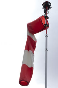 Low angle view of flag against white background