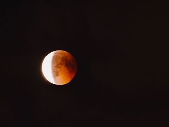 Scenic view of moon against sky at night