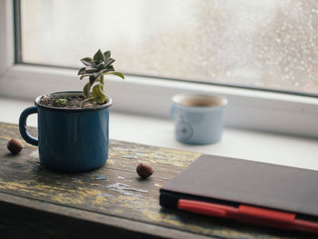 Close-up of coffee cup on table