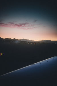 Scenic view of landscape against sky during sunset