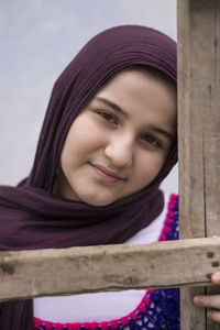 Close-up portrait of a smiling young woman