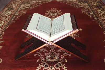 High angle view of open book on table