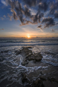 Scenic view of sea against sky during sunset
