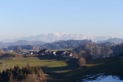 Scenic view of landscape and mountains against sky