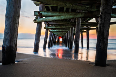 Pier on sea against sky